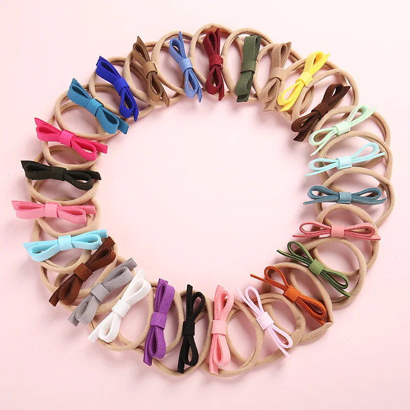 30pcs Boutique Cute Leather Bow Nylon Headbands Mini Bowknot Super Soft Hairbands Princess Headwear Fashion Hair Accessories
30pcs Boutique Cute Leather Bow Nylon Headbands Mini Bowknot Super Soft Hairbands Princess Headwear Fashion Hair Accessories