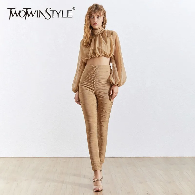 TWOTWINSTYLE Casual Two Piece Sets Women Turtleneck Puff Sleeve Tops High Waist Slim Pants Womens Suit Fashion New 2019 Summer
TWOTWINSTYLE Casual Two Piece Sets Women Turtleneck Puff Sleeve Tops High Waist Slim Pants Womens Suit Fashion New 2019 Summer