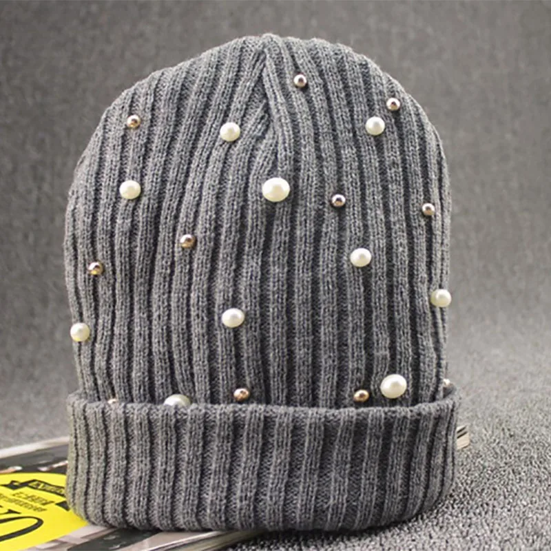 Autumn winter without brim knitted cap large ball handmade pearls knitted hat  high quality lady warm knitted cap 
Autumn winter without brim knitted cap large ball handmade pearls knitted hat  high quality lady warm knitted cap