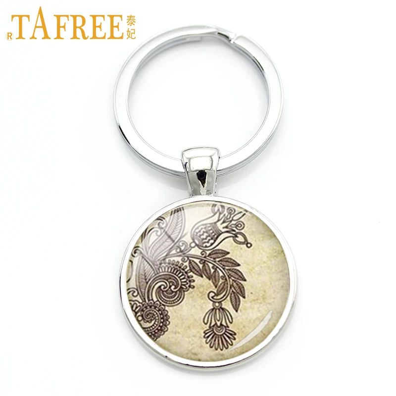 TAFREE New Fashion Henna Zen keychain Mandala Sacred Geometry amulet Flower of Life key chain round Glass novelty jewelry H329
TAFREE New Fashion Henna Zen keychain Mandala Sacred Geometry amulet Flower of Life key chain round Glass novelty jewelry H329