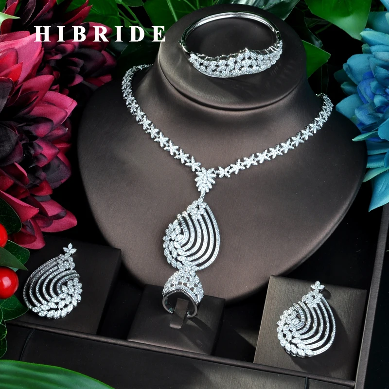 HIBRIDE 4 шт. Свадебные циркониевые Ожерелье Серьги Кольца для женщин для вечеринки роскошный Дубай Нигерия CZ Кристалл Свадебные Ювелирные наборы
HIBRIDE 4 шт. Свадебные циркониевые Ожерелье Серьги Кольца для женщин для вечеринки роскошный Дубай Нигерия CZ Кристалл Свадебные Ювелирные наборы