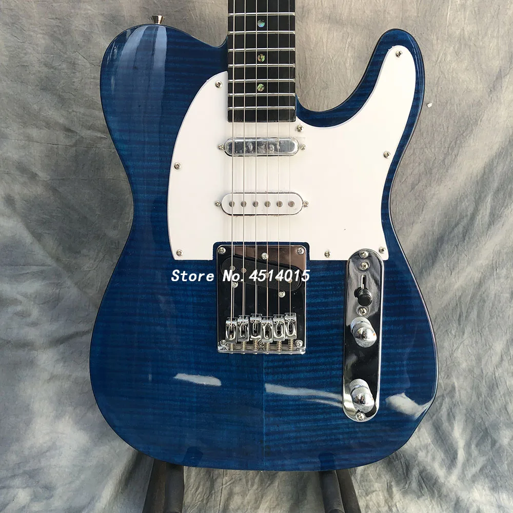 High quality 6 string electric guitar, tiger maple veneer, blue paint, single pickup only, postage included'
High quality 6 string electric guitar, tiger maple veneer, blue paint, single pickup only, postage included'