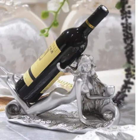 Image beauty of small European green resin creative wine racks household wine bottle shelf modern living room decoration