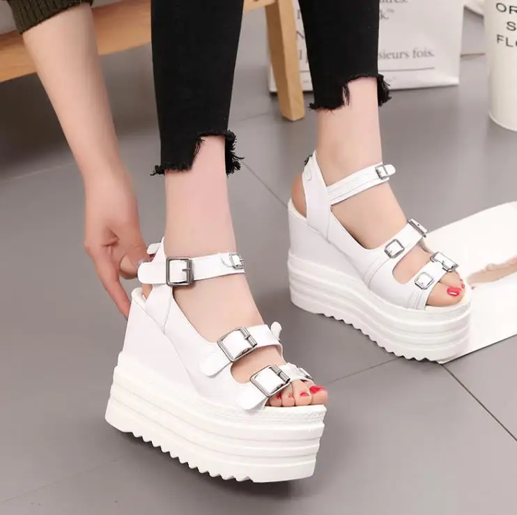 Super high heel height 13cm sandals female 2018 new slope with open toe Roman shoes female sponge cake thick bottom
Super high heel height 13cm sandals female 2018 new slope with open toe Roman shoes female sponge cake thick bottom