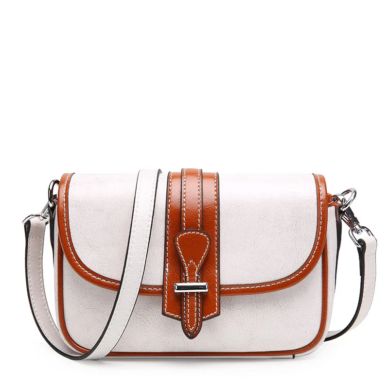 New Korean fashion leather shoulder bag Women's wild personality oblique color contrast small square bag
New Korean fashion leather shoulder bag Women's wild personality oblique color contrast small square bag