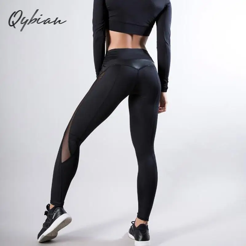 Фото Леггинсы женские спортивные черные с сеткой из искусственной кожи высокой