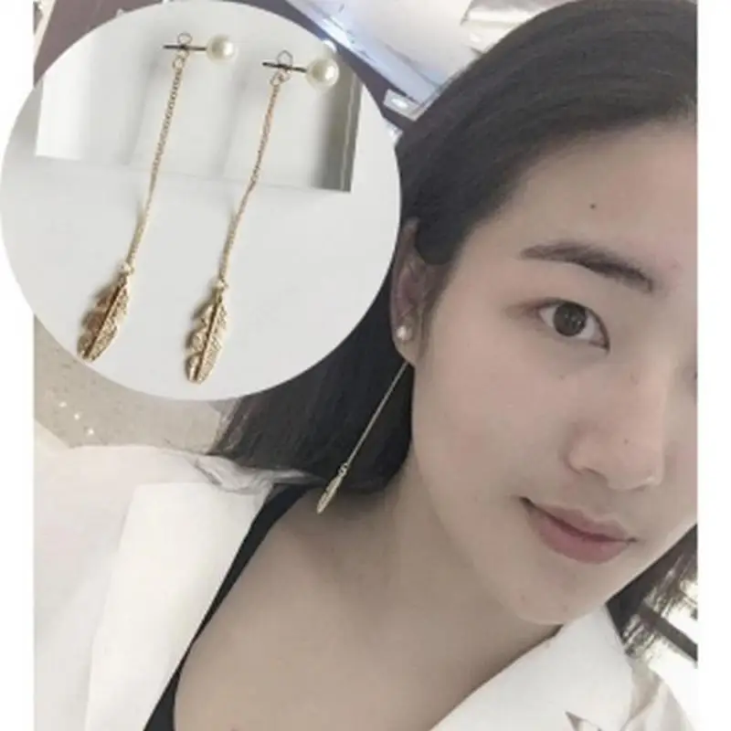 New Personality Feathers And Leaves Long Imitation Pearl Earrings Female Boho Earrings Long Earrings Fashion Jewelry Brincos
New Personality Feathers And Leaves Long Imitation Pearl Earrings Female Boho Earrings Long Earrings Fashion Jewelry Brincos