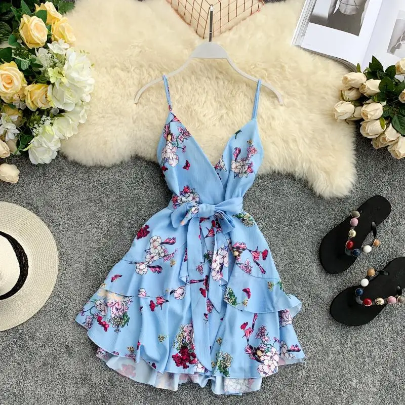 2019 new fashion women's dresses Printed holiday strap sexy V-neck halter waist with irregular ruffled dress
2019 new fashion women's dresses Printed holiday strap sexy V-neck halter waist with irregular ruffled dress