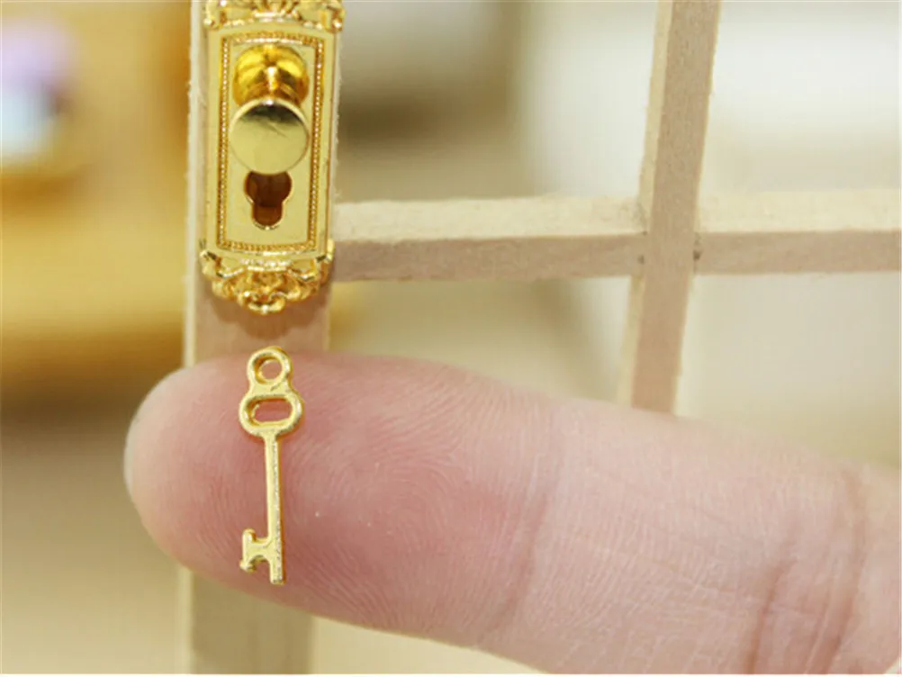 Hot sale 1PC Dollhouse Miniature Brass Knobs Plate with Keyhole Keys Set Door Lock With Keys Door Accessory toy
Hot sale 1PC Dollhouse Miniature Brass Knobs Plate with Keyhole Keys Set Door Lock With Keys Door Accessory toy