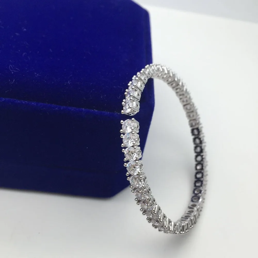 simple fashion jewelry AAA cubic zirconia square stone stunning charm bangle open hand cuff for women and girl party accessories
simple fashion jewelry AAA cubic zirconia square stone stunning charm bangle open hand cuff for women and girl party accessories