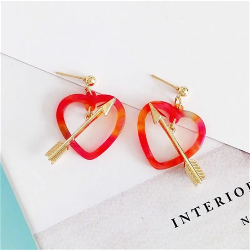 Fashion woman stud earrings Red heart-shaped metal arrow gold earrings for women popular resin heart stud earrings wholesale
Fashion woman stud earrings Red heart-shaped metal arrow gold earrings for women popular resin heart stud earrings wholesale
