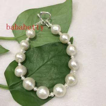 NEW HUGE NATURAL white Natural freshwater pearl coin 12-13mm bracelet Tibetan silver clasp 8"
NEW HUGE NATURAL white Natural freshwater pearl coin 12-13mm bracelet Tibetan silver clasp 8"
