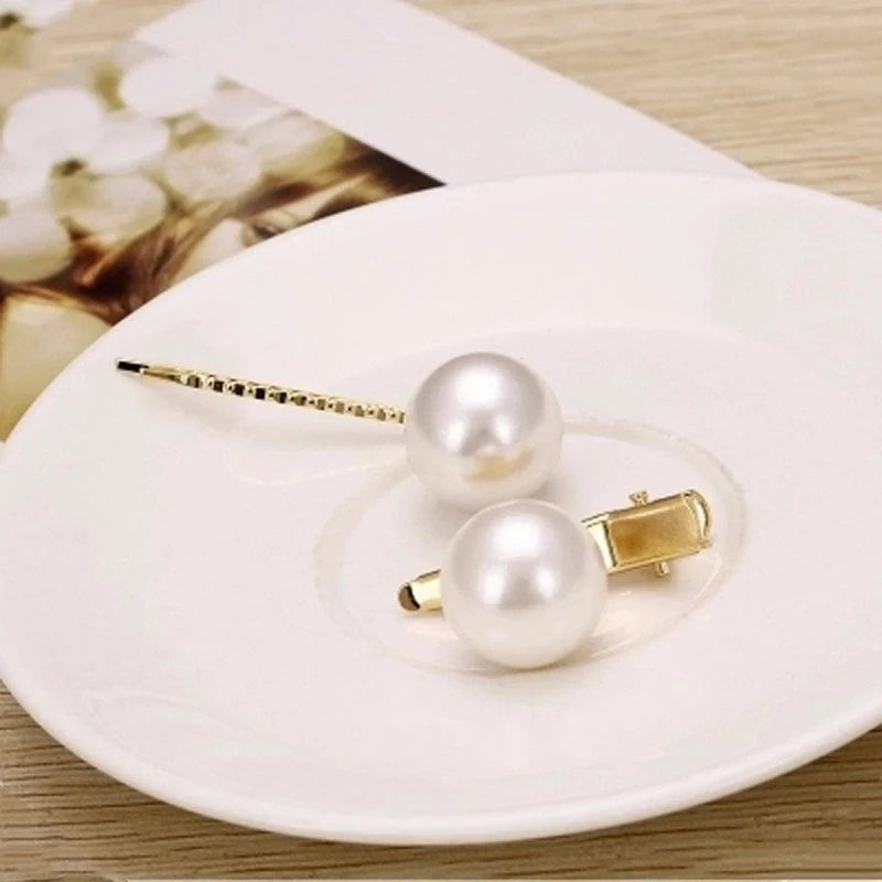 Korean version of big pearl clip small side clip Korea head jewelry hair accessories duckbill clip bangs hairpin BB clip female
Korean version of big pearl clip small side clip Korea head jewelry hair accessories duckbill clip bangs hairpin BB clip female