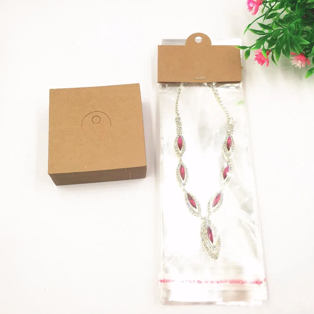 100 sets paper cards with opp jewelry packaging bag, package bag / card with hole for a chain and pendant necklace / accessorie
100 sets paper cards with opp jewelry packaging bag, package bag / card with hole for a chain and pendant necklace / accessorie