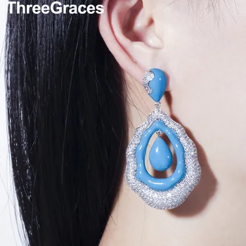 ThreeGraces Summer White Color Cubic Zirconia Crystal Light Bule Wave Long Large Dangle Drop Earrings Jewelry for Ladies ER319
ThreeGraces Summer White Color Cubic Zirconia Crystal Light Bule Wave Long Large Dangle Drop Earrings Jewelry for Ladies ER319