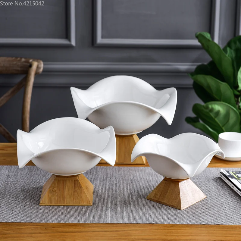 Creative ceramic fruit bowl large fruit bowl Nordic household modern living room snacks storage basket bamboo base ceramic plate
Creative ceramic fruit bowl large fruit bowl Nordic household modern living room snacks storage basket bamboo base ceramic plate