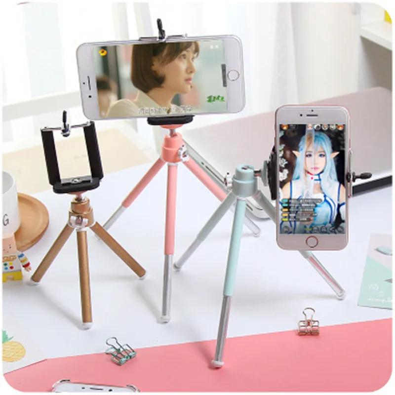 Aaliyah Mini camera phone holder telescopic color twosection tripod desktop photography tripod small digital SLR camera bracket
Aaliyah Mini camera phone holder telescopic color twosection tripod desktop photography tripod small digital SLR camera bracket