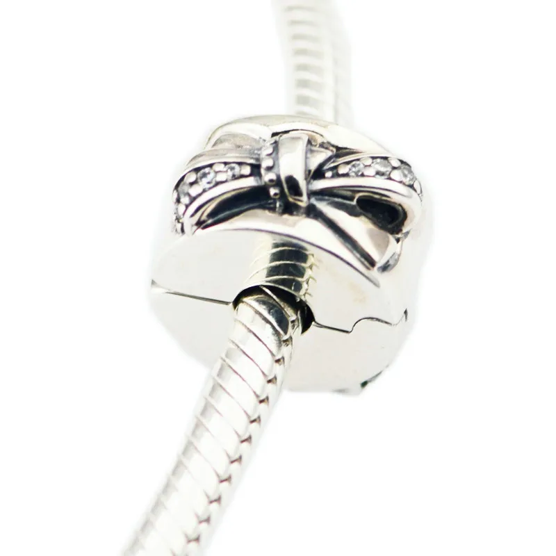 Authentic 925 Sterling Silver Beads With Shiny Bow Clip Clear CZ for Jewelry Making Fit Bracelets DIY Fine Jewelry SL049
Authentic 925 Sterling Silver Beads With Shiny Bow Clip Clear CZ for Jewelry Making Fit Bracelets DIY Fine Jewelry SL049