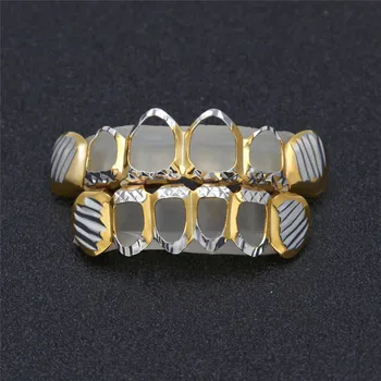 New Hiphop Cool Teeth Grils Dental For Men & Women Bling Hollow Grillz Jewelry For Halloween Ice Out Hip Hop Vampire Tooth
New Hiphop Cool Teeth Grils Dental For Men & Women Bling Hollow Grillz Jewelry For Halloween Ice Out Hip Hop Vampire Tooth