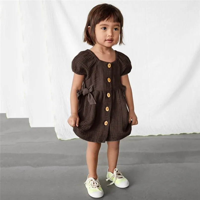 Toddler Baby Girls Bowknot Short Sleeve Solid Princess Button Princess Dress Outfit Dropshipping kiz cocuk elbise 20H
Toddler Baby Girls Bowknot Short Sleeve Solid Princess Button Princess Dress Outfit Dropshipping kiz cocuk elbise 20H