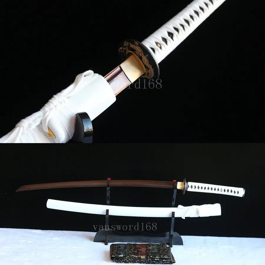 Hand forged red damascus folded steel japanese samurai katana real sharp sword.
Hand forged red damascus folded steel japanese samurai katana real sharp sword.