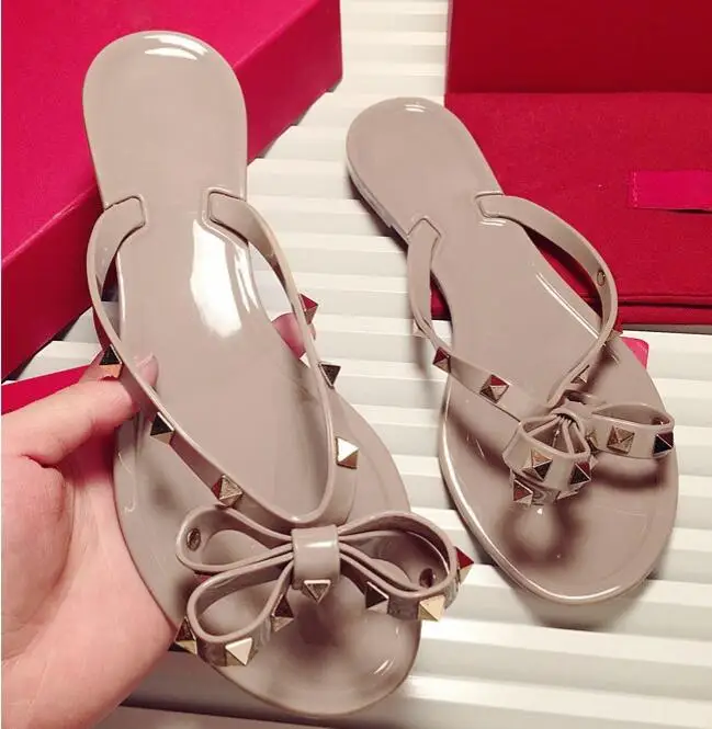 Brand Flat Slipper Butterfly-tied Riveted Flat-soled Flip-flop Slippers Women's Skid-proof Jelly Beach Shoes no include box
Brand Flat Slipper Butterfly-tied Riveted Flat-soled Flip-flop Slippers Women's Skid-proof Jelly Beach Shoes no include box