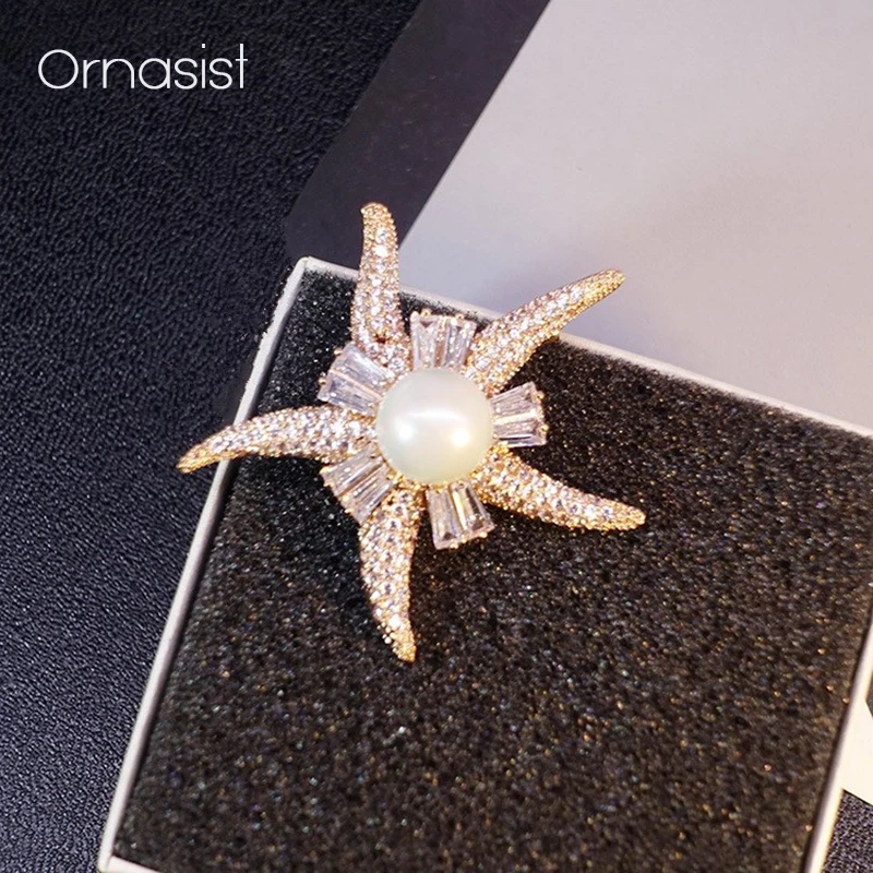 Korean Fashion Starfish Brooch Pin For Women Micro-inlaid Zircon Simulation Pearl Brooches Female Good Quality Mother Gift
Korean Fashion Starfish Brooch Pin For Women Micro-inlaid Zircon Simulation Pearl Brooches Female Good Quality Mother Gift