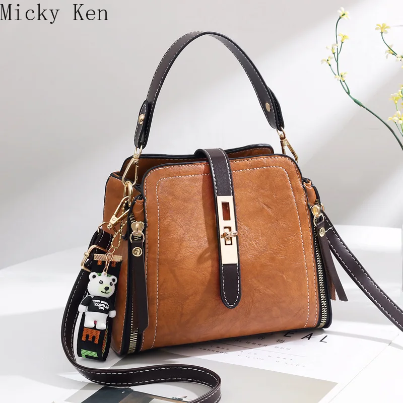 New ladies bag fashion retro bucket bag Messenger bag ladies handbag cartoon pendant shoulder bag
New ladies bag fashion retro bucket bag Messenger bag ladies handbag cartoon pendant shoulder bag
