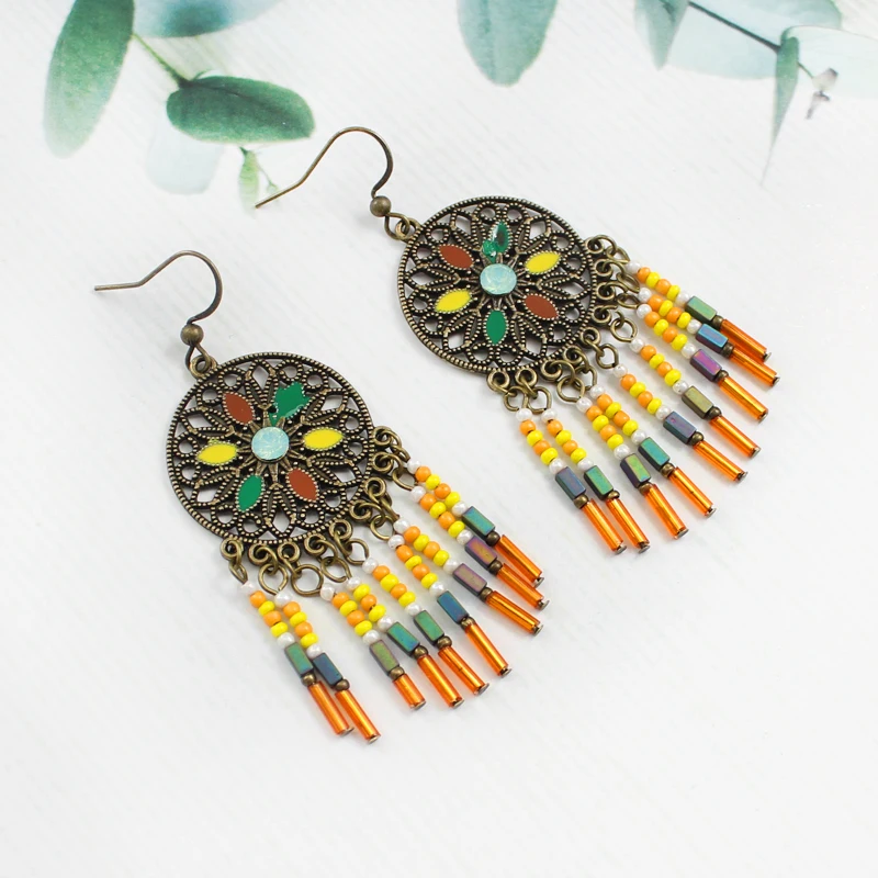 Retro Color Sun Flower Multicolor Beads Crystal Tassel Bohemian Earrings National Wind Female Holiday Charm Accessories
Retro Color Sun Flower Multicolor Beads Crystal Tassel Bohemian Earrings National Wind Female Holiday Charm Accessories