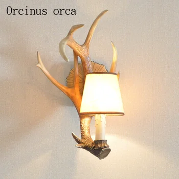 American living room bedroom lamp wall lamp European corridor antlers creative personality retro simple background bedside lamp
American living room bedroom lamp wall lamp European corridor antlers creative personality retro simple background bedside lamp