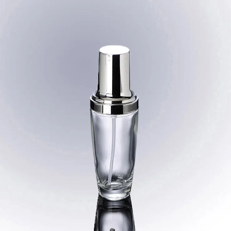 30ML transparent glass bottle with silver press pump for serum/lotion/foundation/emulsion Cosmetic Packaging
30ML transparent glass bottle with silver press pump for serum/lotion/foundation/emulsion Cosmetic Packaging