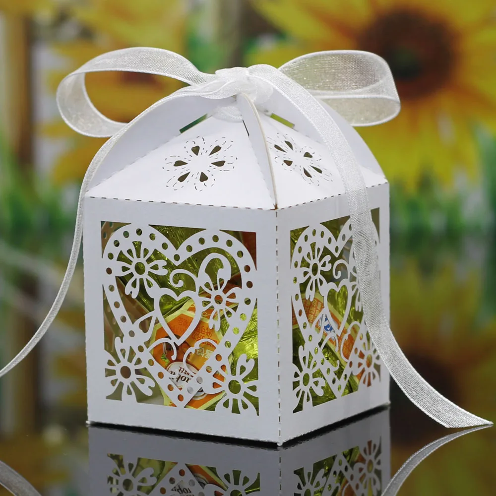 100Pcs Love Heart Laser Cut Hollow Carriage Favors Gifts Candy Boxes With Ribbon Baby Shower Wedding Party best Gift box
100Pcs Love Heart Laser Cut Hollow Carriage Favors Gifts Candy Boxes With Ribbon Baby Shower Wedding Party best Gift box