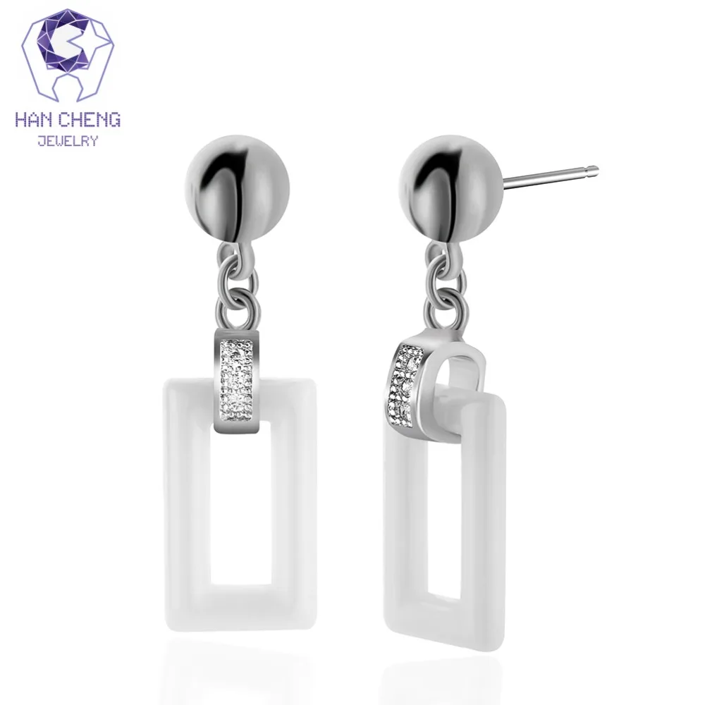 HanCheng New Fashion Golden Silver Dangle Hanging Cubic Zirconia Ceramic Square Drop Earrings For Women Jewelry brincos bijoux
HanCheng New Fashion Golden Silver Dangle Hanging Cubic Zirconia Ceramic Square Drop Earrings For Women Jewelry brincos bijoux