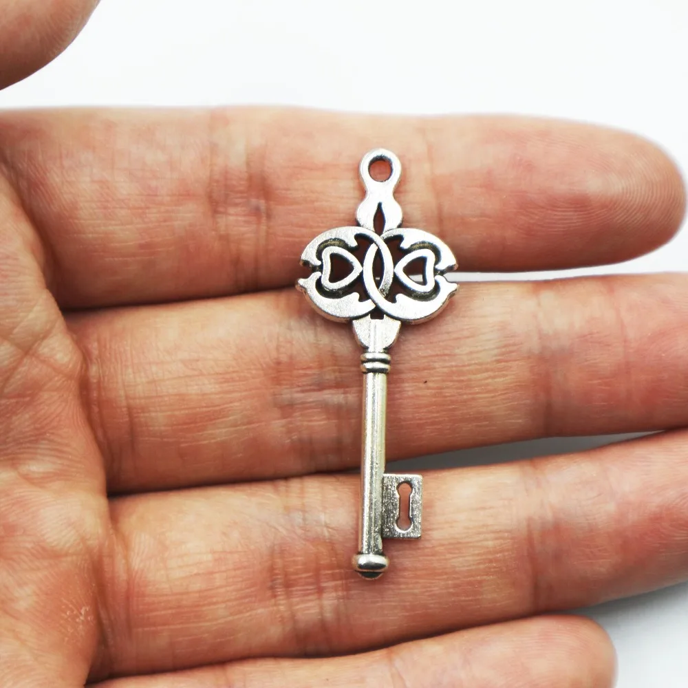Hot sell 12pcs metal antique silver charms key charms pendant for necklace jewelry findings
Hot sell 12pcs metal antique silver charms key charms pendant for necklace jewelry findings