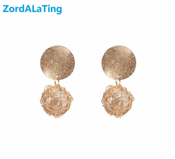 Golden bird's nest pearl Cool wind exaggerates earrings for women girl Retro temperament cute simple student eardrop jewelry
Golden bird's nest pearl Cool wind exaggerates earrings for women girl Retro temperament cute simple student eardrop jewelry