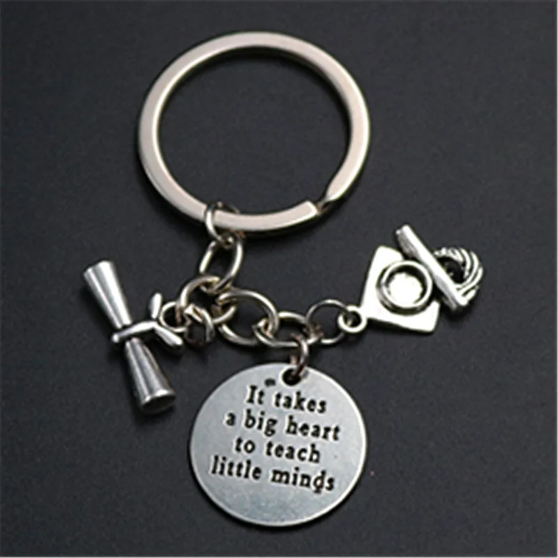 1pc creative Antique silver It takes a big heart to teach little minds charm graduation cap & graduation certificate keychain
1pc creative Antique silver It takes a big heart to teach little minds charm graduation cap & graduation certificate keychain