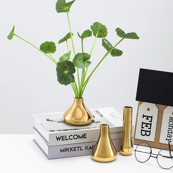Golden Ceramic Vase ornaments Crafts Mini Small flower vases wedding vases for table decorations gold vases home decoration
Golden Ceramic Vase ornaments Crafts Mini Small flower vases wedding vases for table decorations gold vases home decoration