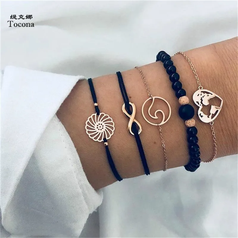 Tocona 5PCS/Set Bohemia Wave Map Infinity Charm Beaded Chain Bracelets Set Black Rope Chian Bangle Jewelry for Women 6921
Tocona 5PCS/Set Bohemia Wave Map Infinity Charm Beaded Chain Bracelets Set Black Rope Chian Bangle Jewelry for Women 6921