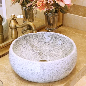China Artistic Handmade Ceramic wash basin Round Counter top china wash basin bathroom sinks Countertop Washbasin 
China Artistic Handmade Ceramic wash basin Round Counter top china wash basin bathroom sinks Countertop Washbasin