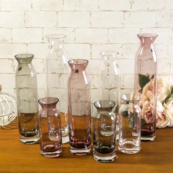 Modern Style Glass Bottle Vase Cylindrical Flower Vase Home Decorative Floral Glass Bottle with Ribbon Wedding Decor Glass Vase
Modern Style Glass Bottle Vase Cylindrical Flower Vase Home Decorative Floral Glass Bottle with Ribbon Wedding Decor Glass Vase