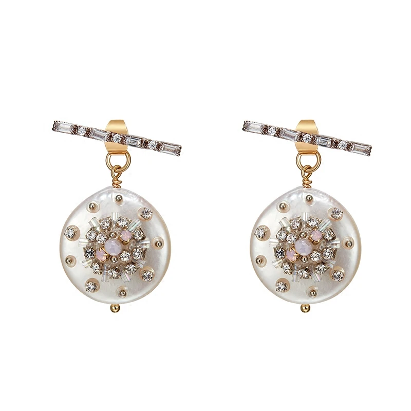 Korean version of the move peach hand-drilled crystal natural shell earrings fairy temperament earrings femal
Korean version of the move peach hand-drilled crystal natural shell earrings fairy temperament earrings femal