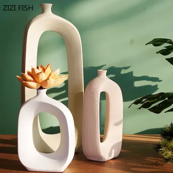 Nordic simple ceramic stem flower Hollow vase Floral ornaments Home living room countertop decoration flower insert Creative
Nordic simple ceramic stem flower Hollow vase Floral ornaments Home living room countertop decoration flower insert Creative