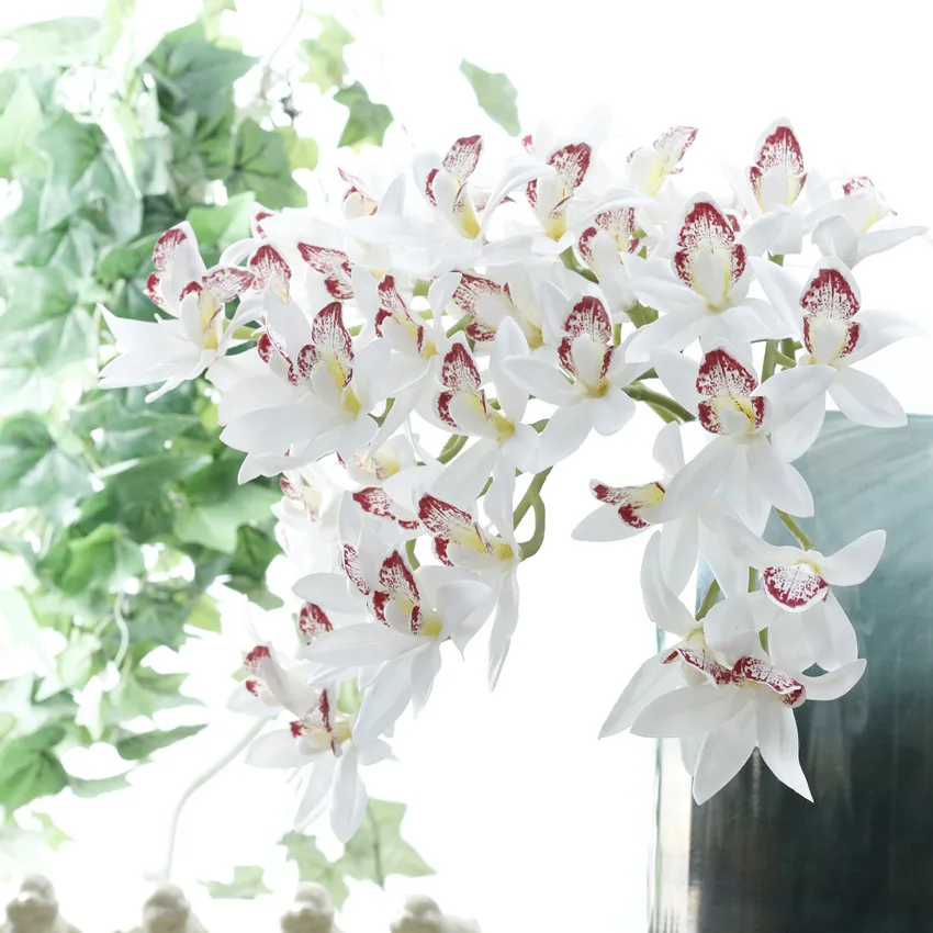 3D 9 heads real touch silk artificial orchids flowers branch home wedding decorative floral arrangement
3D 9 heads real touch silk artificial orchids flowers branch home wedding decorative floral arrangement