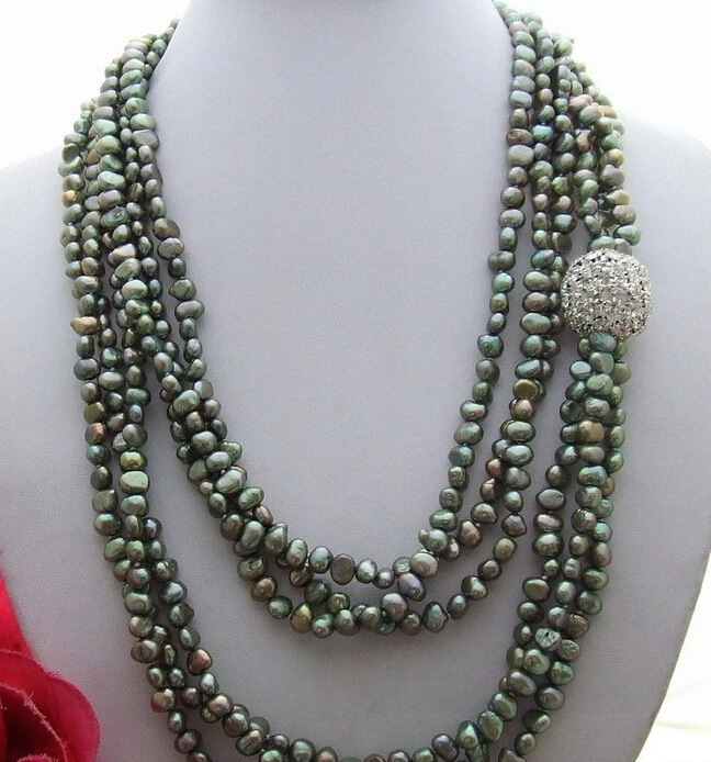 HOT 003396 3Strds 49" Green Pearl Necklace
HOT 003396 3Strds 49" Green Pearl Necklace