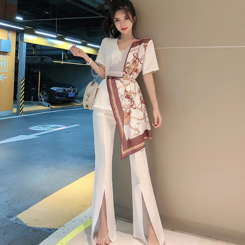 JSXDHK New Fashion Women 2 Piece Set Women Chiffon Hit Color Floral Print Irregula Tops + White Split Bell-bottoms Pants Set
JSXDHK New Fashion Women 2 Piece Set Women Chiffon Hit Color Floral Print Irregula Tops + White Split Bell-bottoms Pants Set
