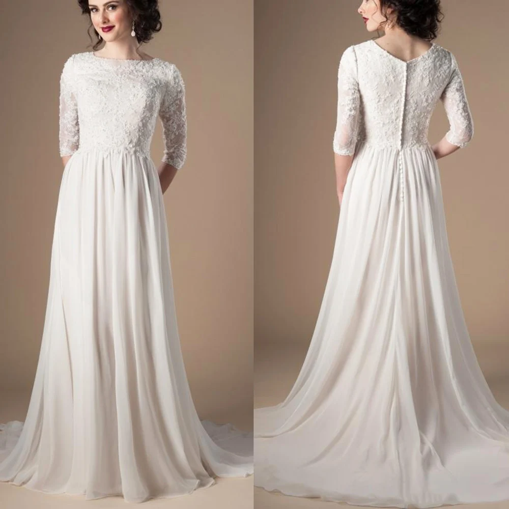 Винтажное свадебное платье с полурукавами кружевом и бусинами элегантное