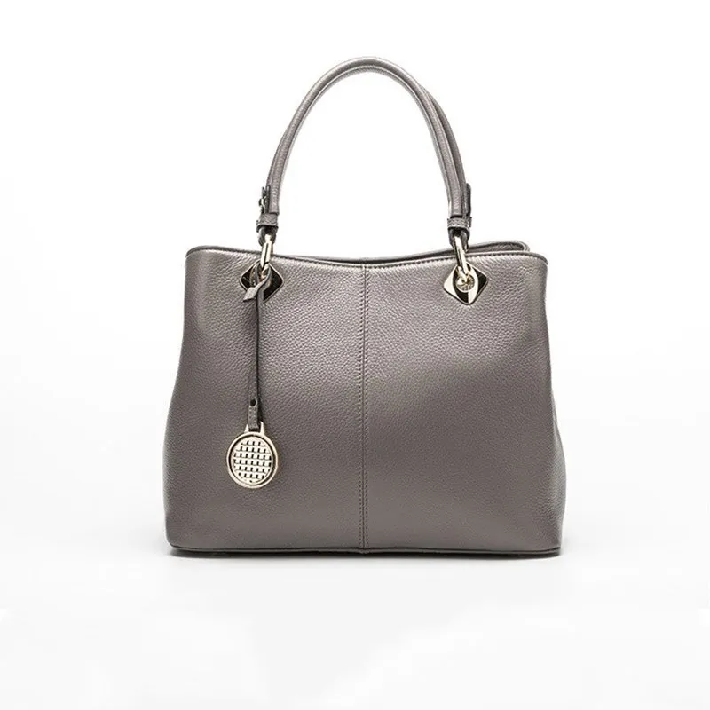 High-end temperament handbag 2018 summer one-shoulder cowhide handbag fashion leather handbag bag ladies simple Messenger bag
High-end temperament handbag 2018 summer one-shoulder cowhide handbag fashion leather handbag bag ladies simple Messenger bag