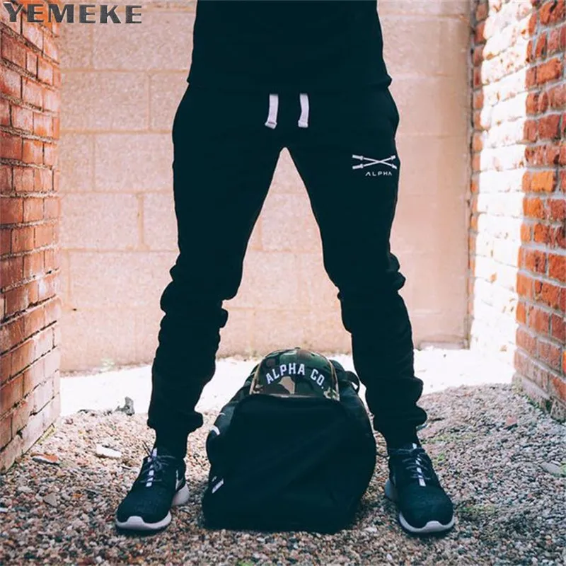 YEMEKE2017 men muscle autumn winter sweatpants men's quality fashion casual life trousers fitness gyms long pants
YEMEKE2017 men muscle autumn winter sweatpants men's quality fashion casual life trousers fitness gyms long pants