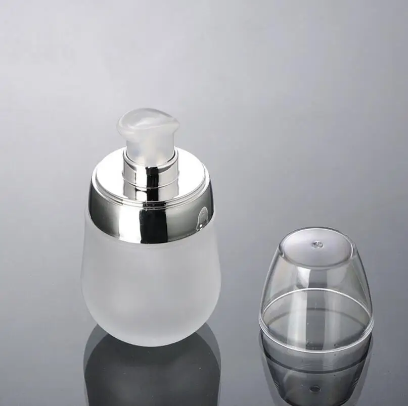 100pcs/Lot 30ml clear matte glass bottle with silver/gold lotion pump 30ml empty glass lotion bottle
100pcs/Lot 30ml clear matte glass bottle with silver/gold lotion pump 30ml empty glass lotion bottle
