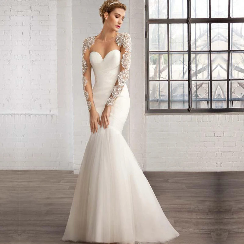 2015 Winter Wedding Dress Long Sleeve Sequins Sheer Backless Shiny Luxury Crystals Chapel Train abiti da sposa principessa
2015 Winter Wedding Dress Long Sleeve Sequins Sheer Backless Shiny Luxury Crystals Chapel Train abiti da sposa principessa